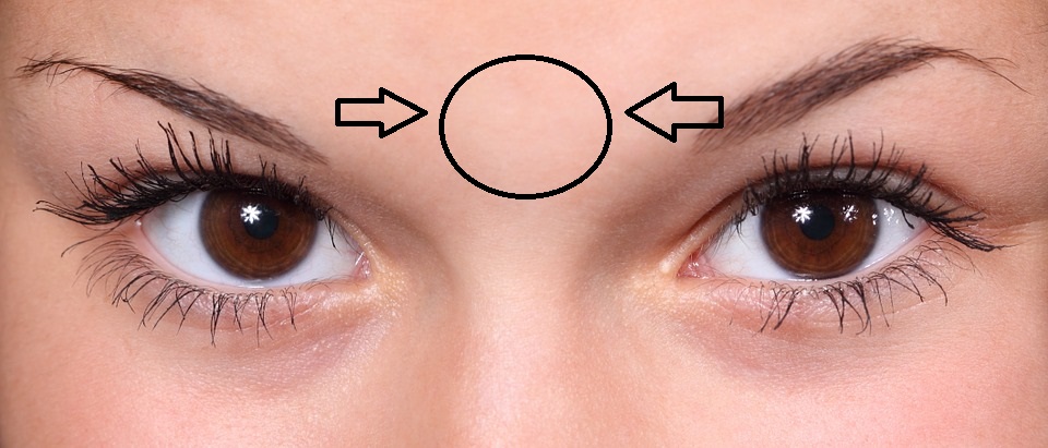 Relieve Headache - Slightly pinch the spot between your eyebrows